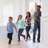 family entering home